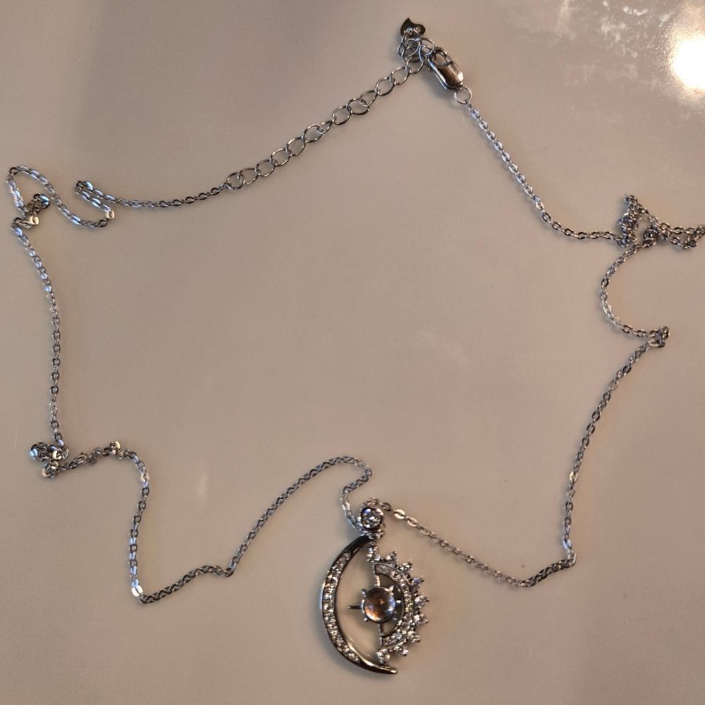 Celestial Silver Necklace with Moon and Star Pendant - Picture 4 of 9